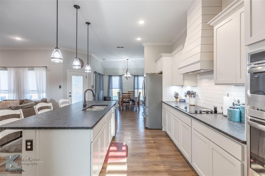 138 Lisa Lane Tuscola, TX 79562 - Photo 11 of 38 a kitchen with counter space a sink and appliances