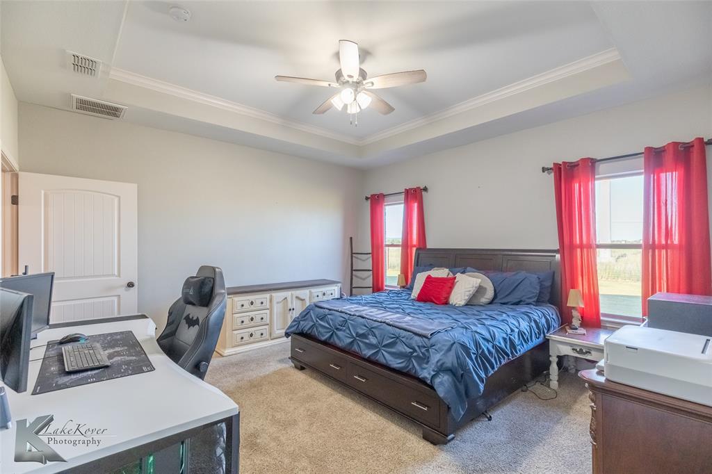 138 Lisa Lane Tuscola, TX 79562 - Photo 21 of 38 a bedroom with a bed and window