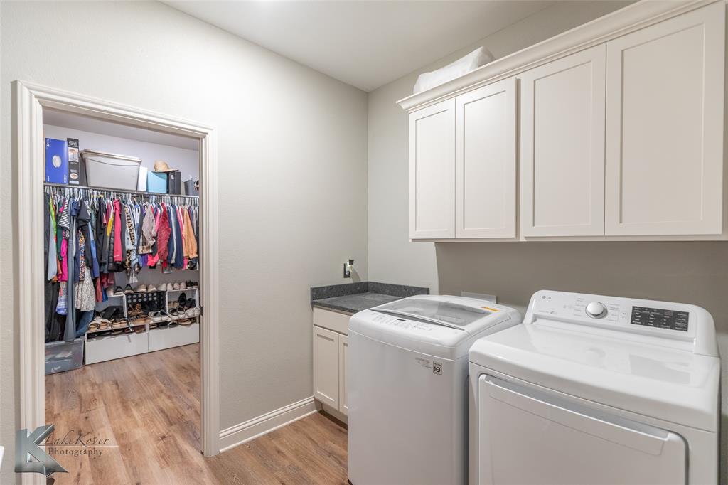 138 Lisa Lane Tuscola, TX 79562 - Photo 25 of 38 a view of storage and utility room with washer and dryer