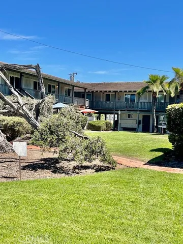 a view of a house with a swimming pool