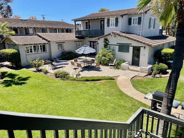 3080 Lincoln Street, Unit 17 Carlsbad, CA 92008 - Photo 26 of 26 a view of a house with backyard and sitting area