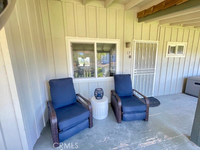 3080 Lincoln Street, Unit 17 Carlsbad, CA 92008 - Photo 3 of 26 a view of a couch in a room