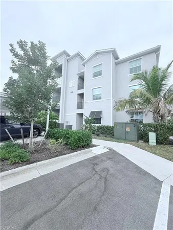 a view of a house with a street