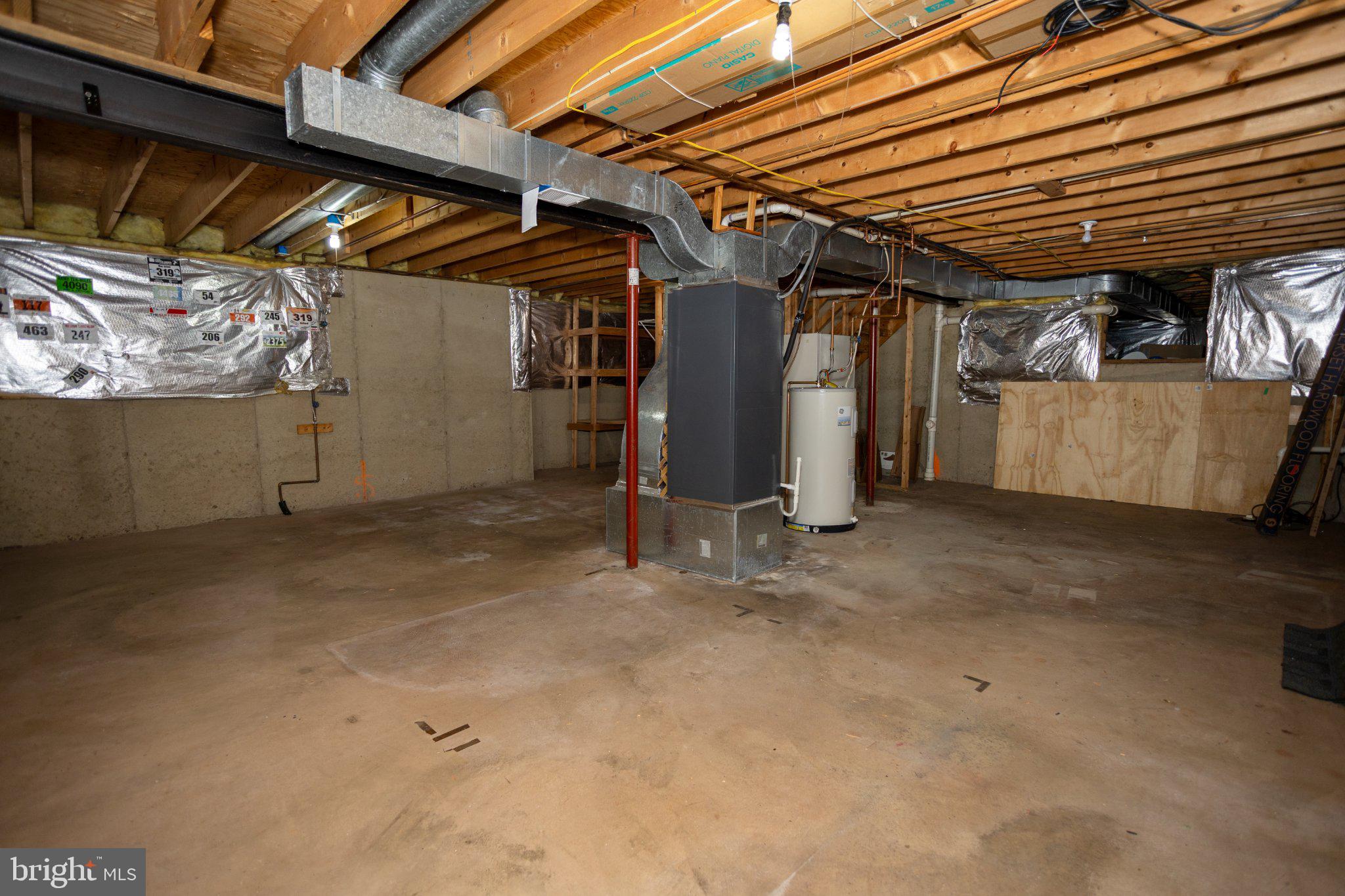 10412 Labrador Loop Manassas, VA 20112 - Photo 51 of 58 Spacious, unfinished basement ready for ideas.