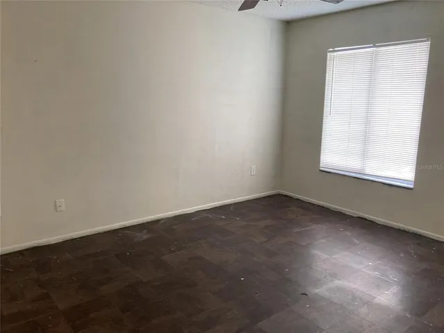 a bathroom with a toilet bathtub and shower