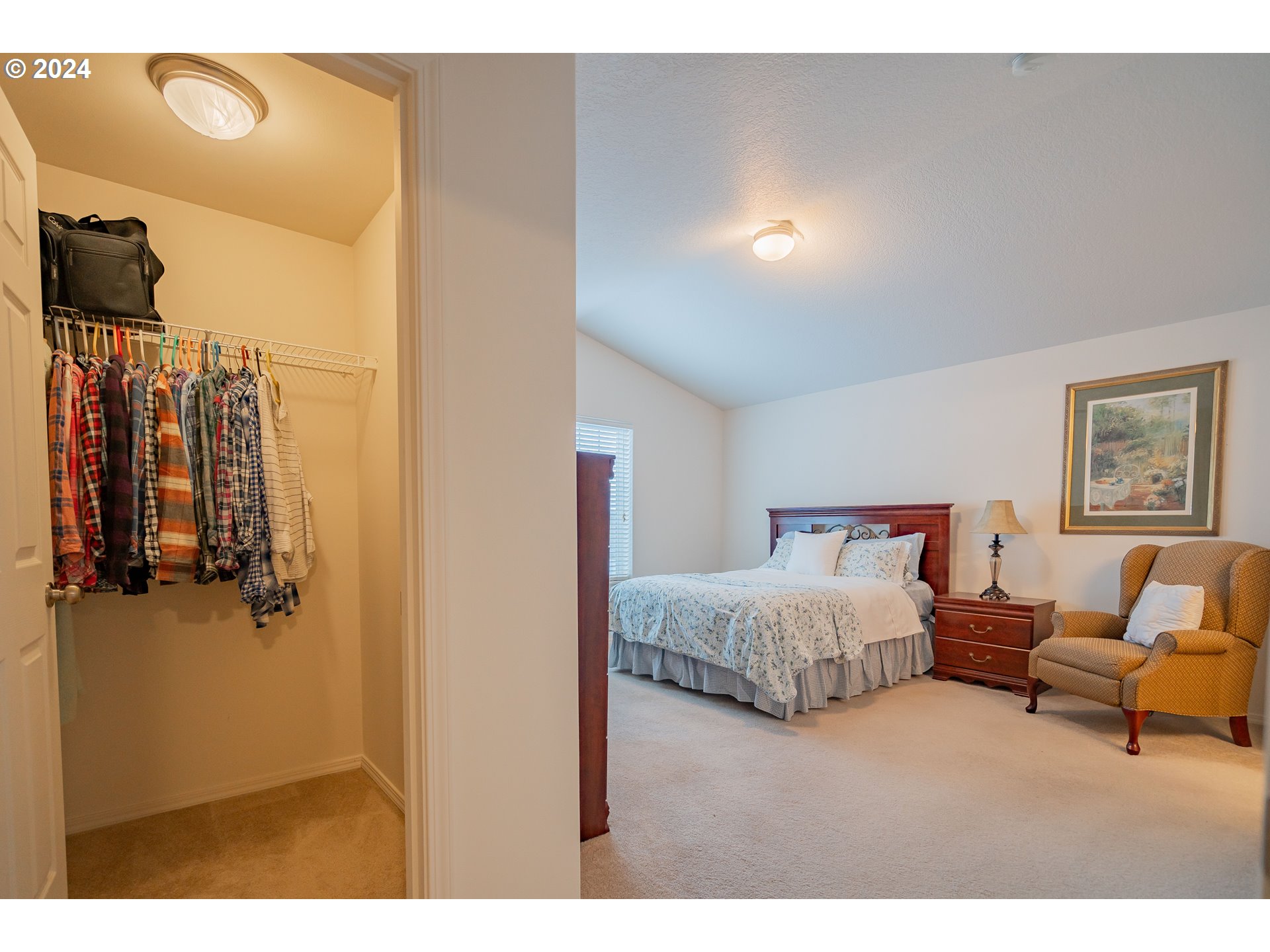 1420 Southeast 5th Way Battle Ground, WA 98604 - Photo 12 of 32 a bedroom with a bed and a night stand