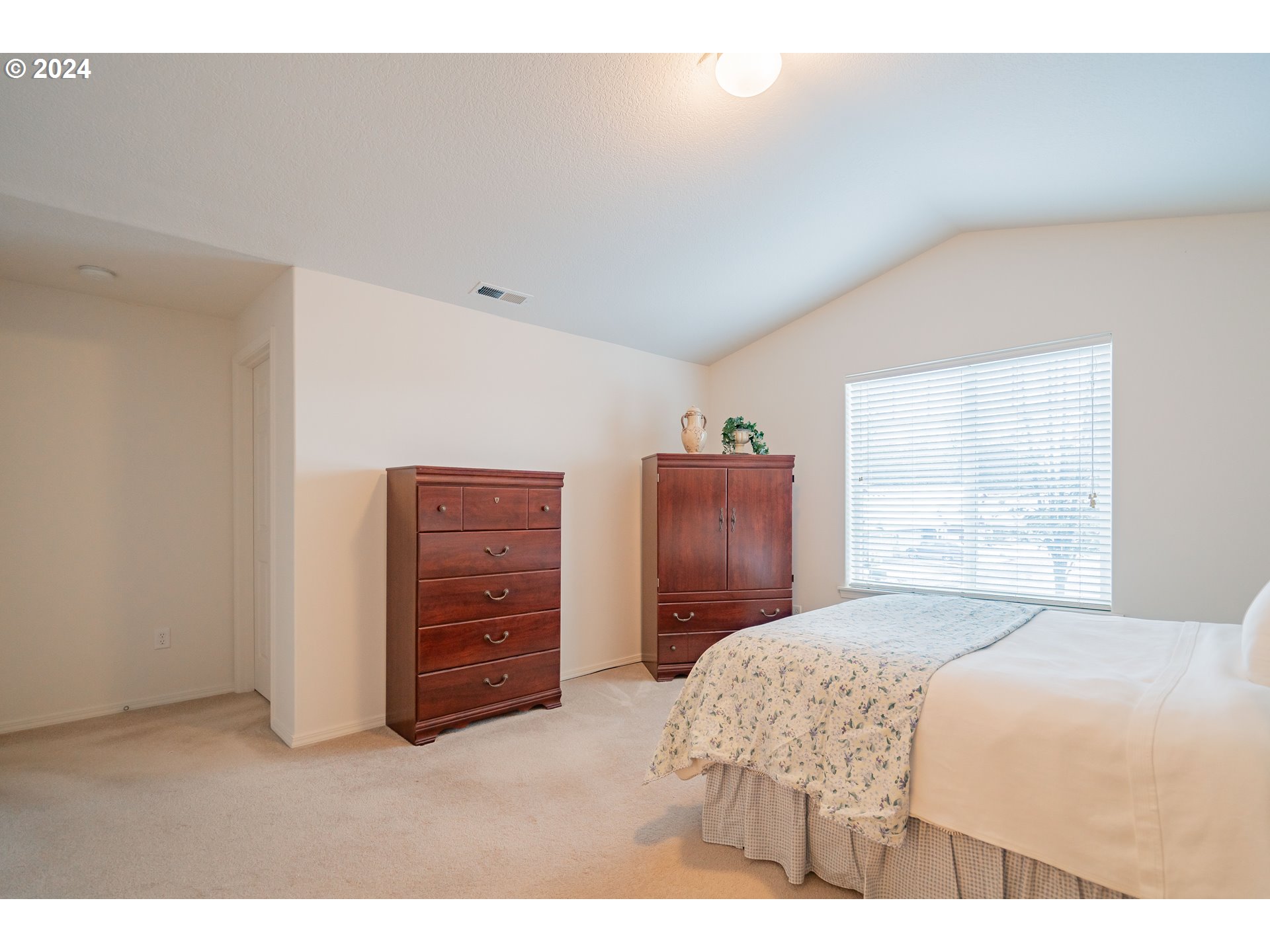1420 Southeast 5th Way Battle Ground, WA 98604 - Photo 14 of 32 a bedroom with a bed and a closet