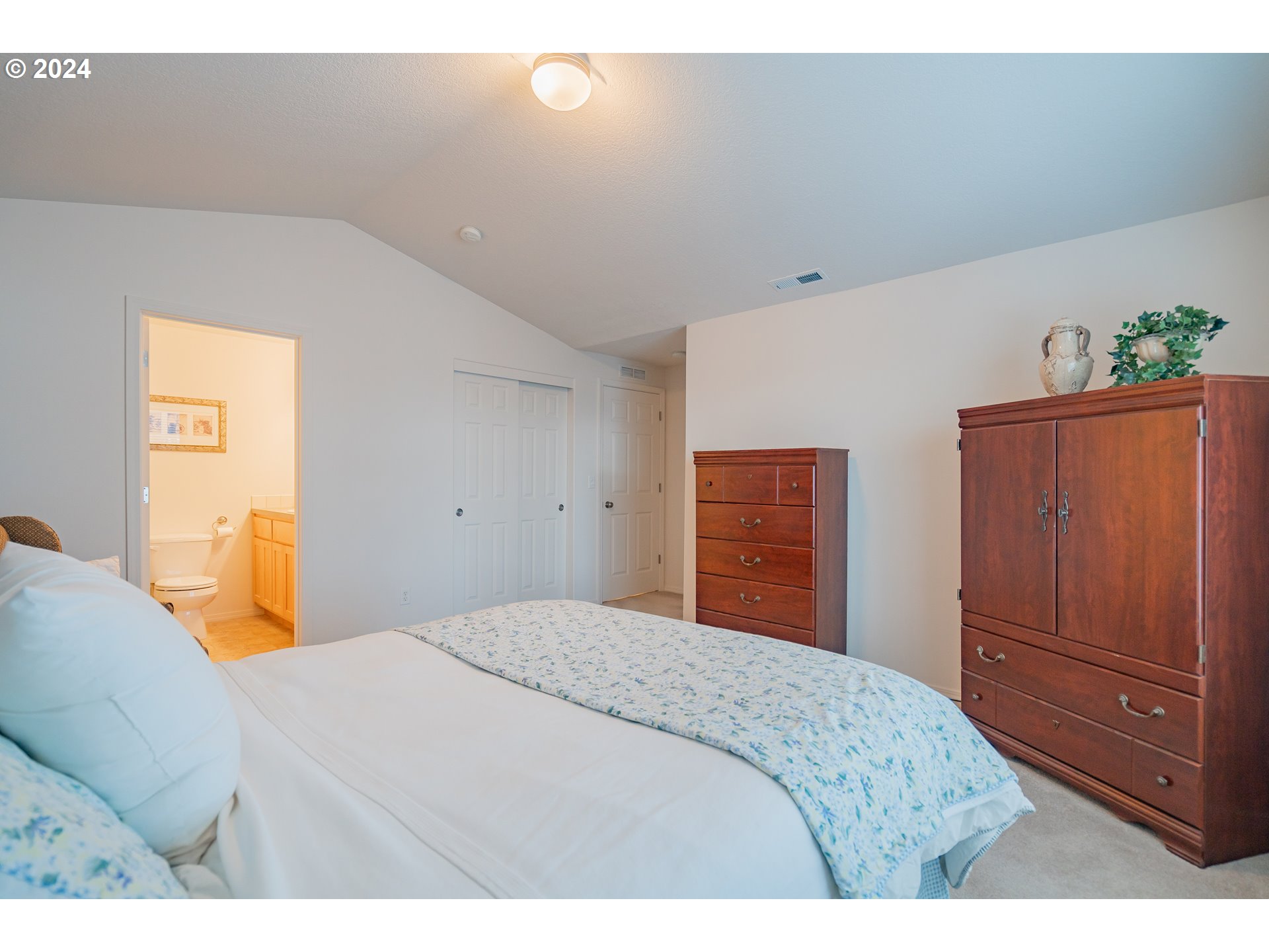 1420 Southeast 5th Way Battle Ground, WA 98604 - Photo 15 of 32 a bedroom with a bed and a dresser
