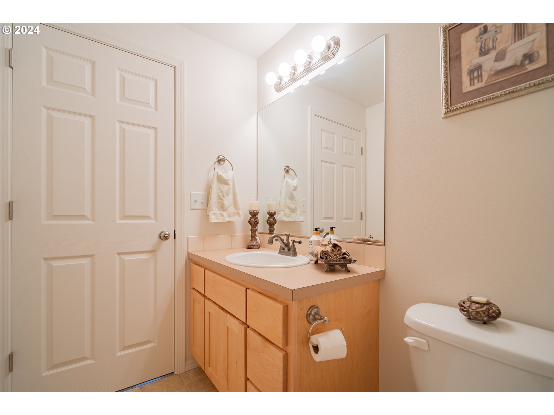 1420 Southeast 5th Way Battle Ground, WA 98604 - Photo 20 of 32 a bathroom with a sink vanity and mirror