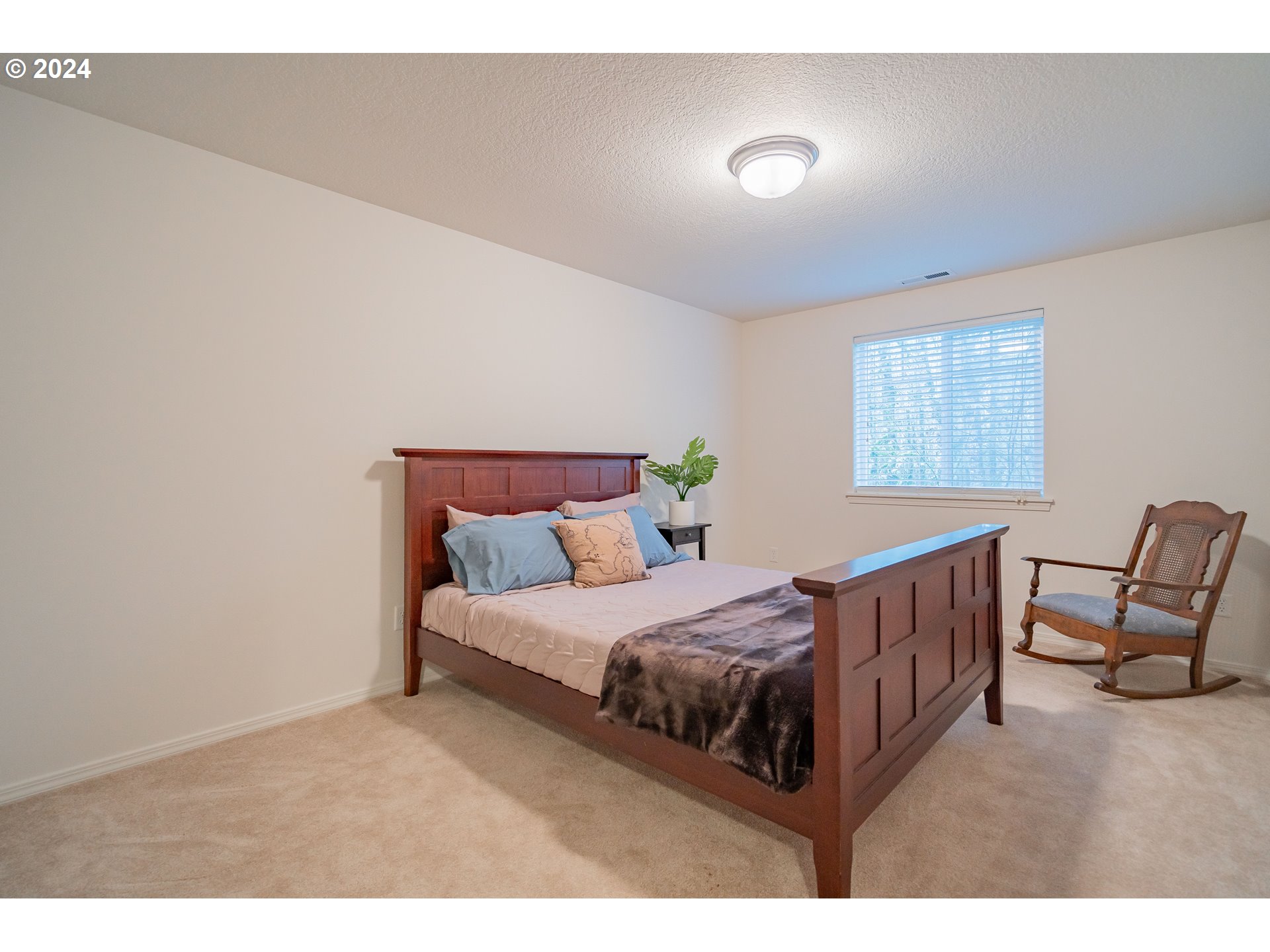1420 Southeast 5th Way Battle Ground, WA 98604 - Photo 21 of 32 a bedroom with a bed and a window