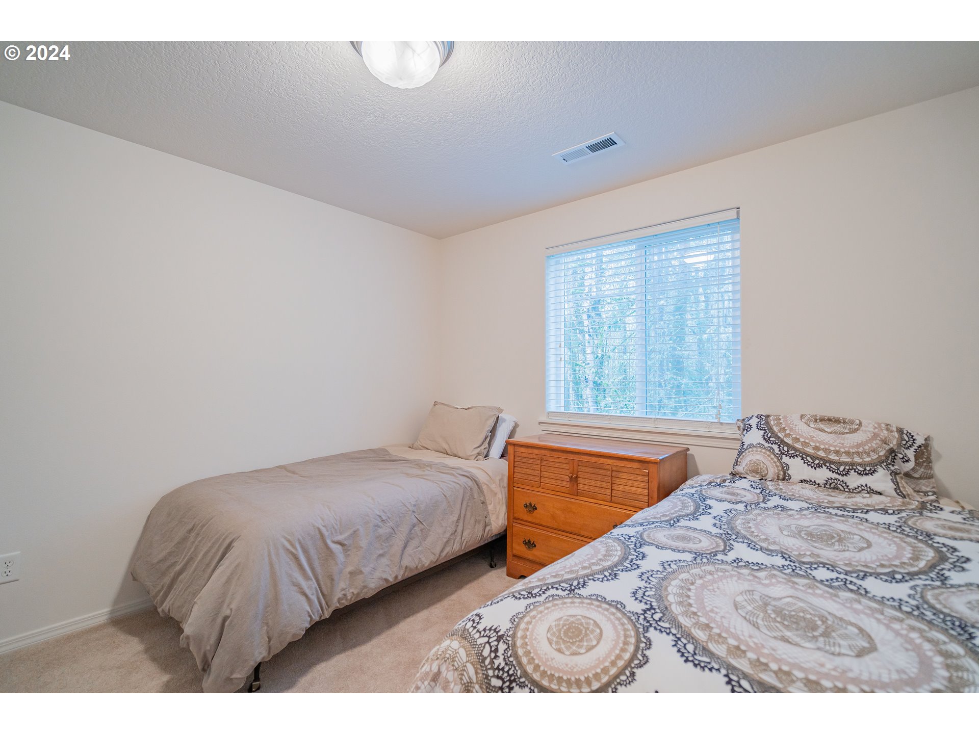 1420 Southeast 5th Way Battle Ground, WA 98604 - Photo 25 of 32 a bedroom with a bed and window