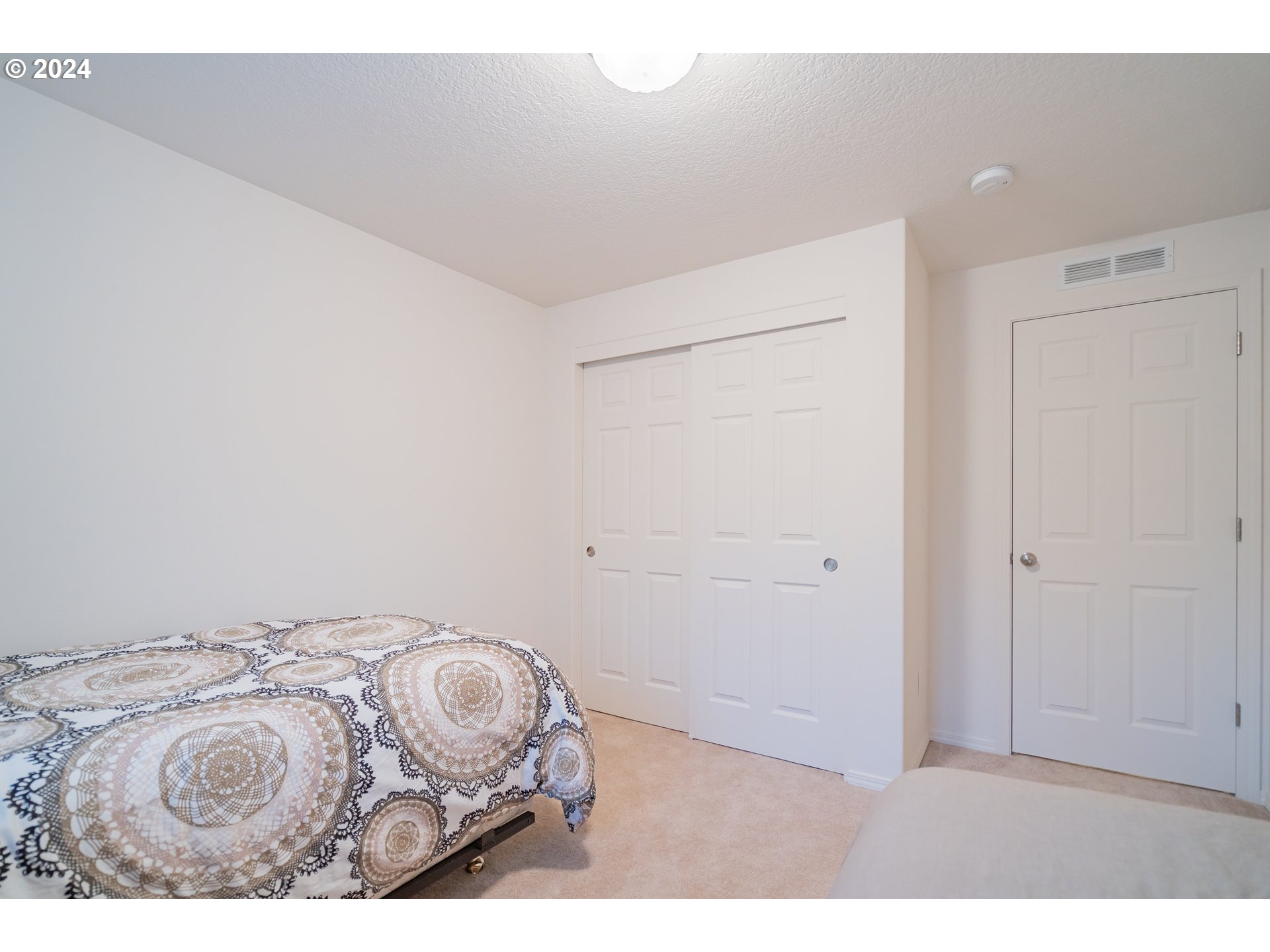 1420 Southeast 5th Way Battle Ground, WA 98604 - Photo 26 of 32 a bedroom with a bed and a bathroom