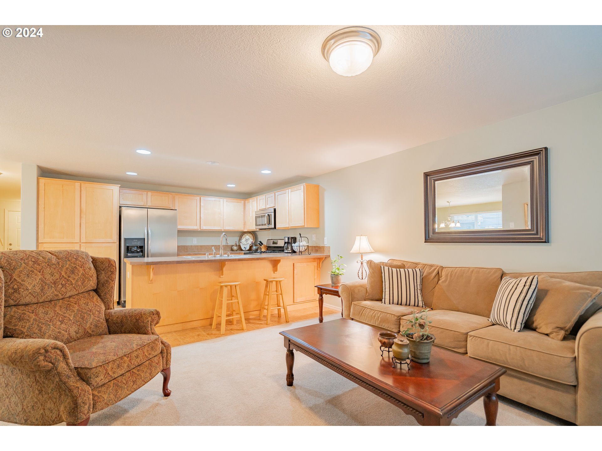 1420 Southeast 5th Way Battle Ground, WA 98604 - Photo 10 of 32 a living room with furniture and a view of kitchen