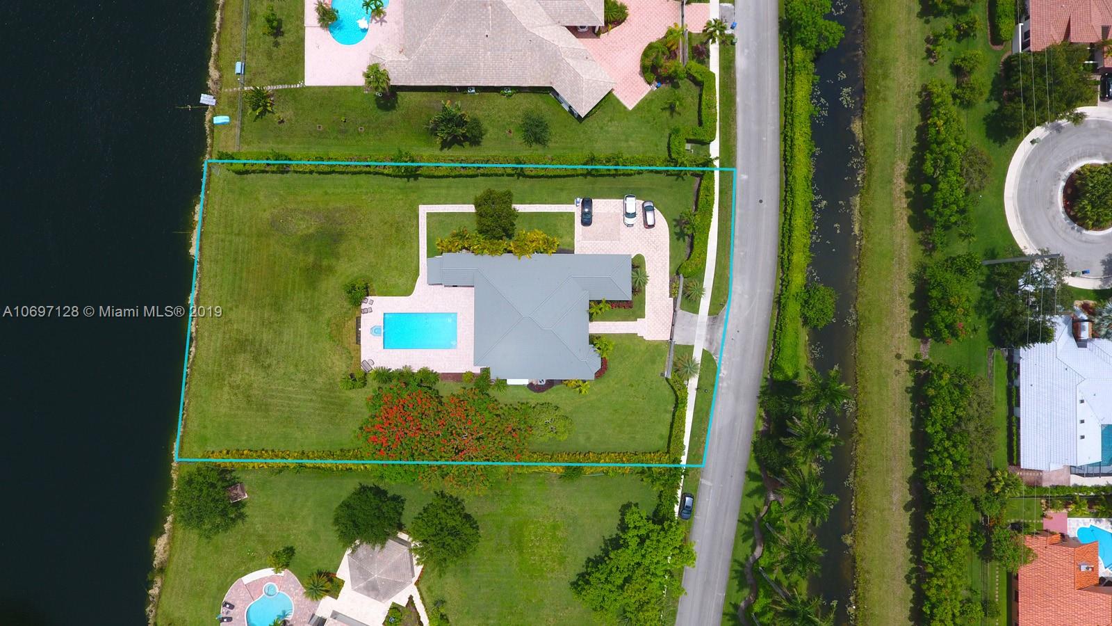 541 Ranch Road Weston, FL 33326 - Photo 36 of 41 an aerial view of a house having outdoor space