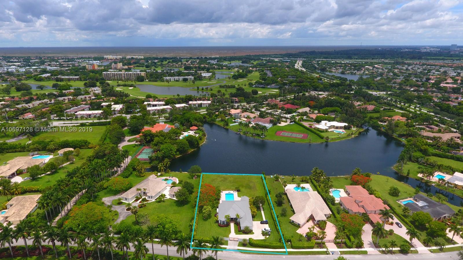 541 Ranch Road Weston, FL 33326 - Photo 37 of 41 an aerial view of residential houses with outdoor space and trees