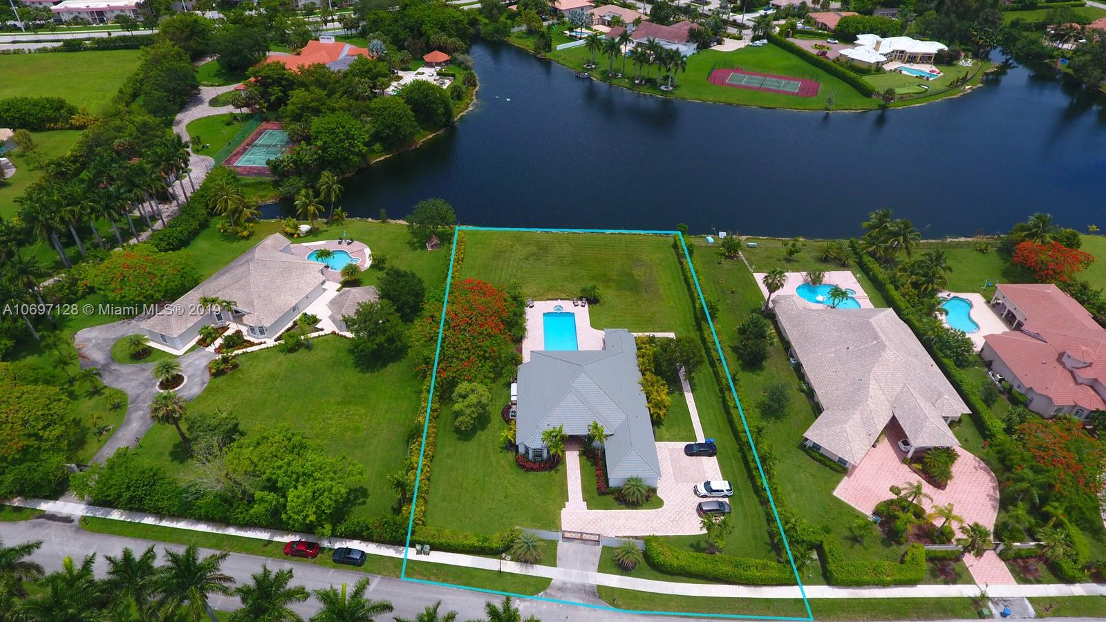 541 Ranch Road Weston, FL 33326 - Photo 38 of 41 an aerial view of house with a yard and swimming pool