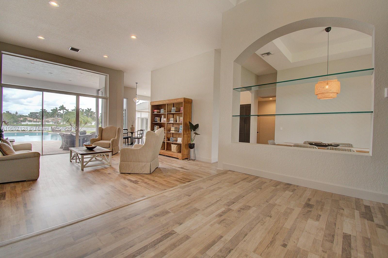 541 Ranch Road Weston, FL 33326 - Photo 4 of 41 a living room with furniture