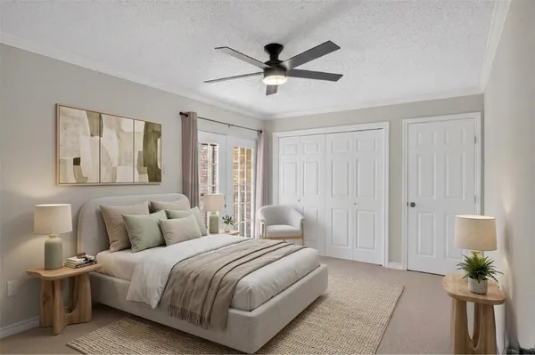 a bedroom with a bed and window