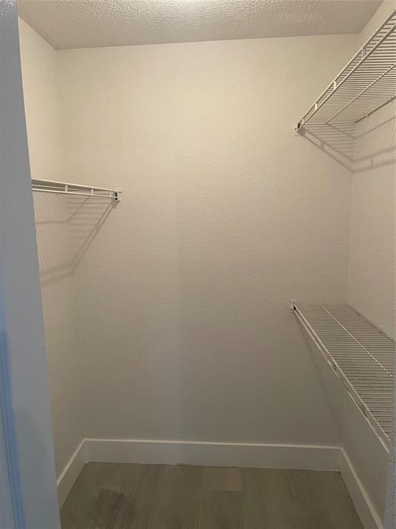 8100 Geneva Court, Unit 535 Doral, FL 33166 - Photo 15 of 27 a view of small space with racks on the wall