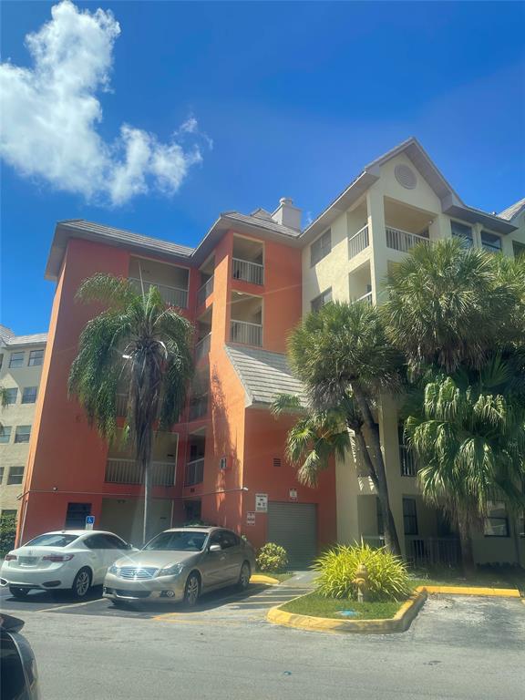 8100 Geneva Court, Unit 535 Doral, FL 33166 - Photo 27 of 27 a front view of house with yard and green space