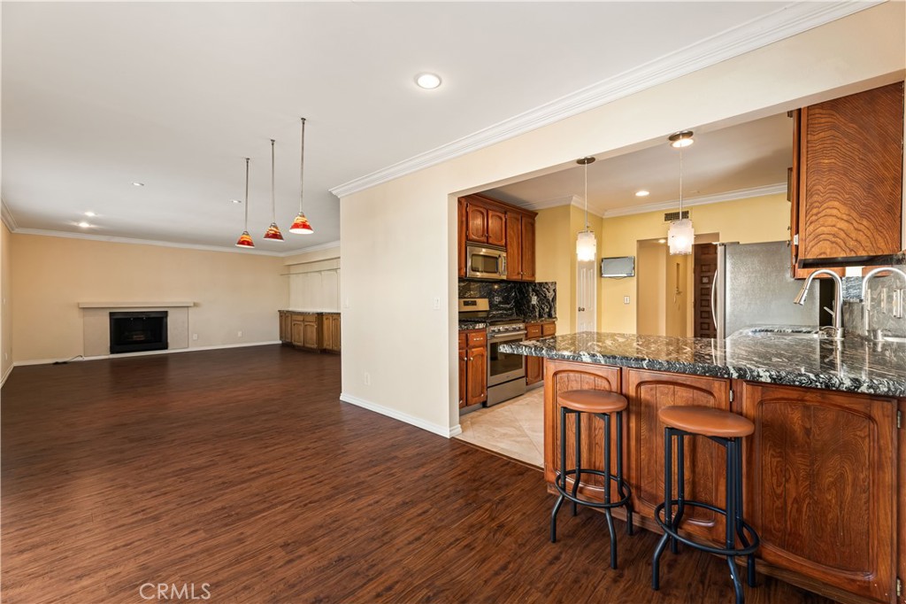 a view of a kitchen and dining room
