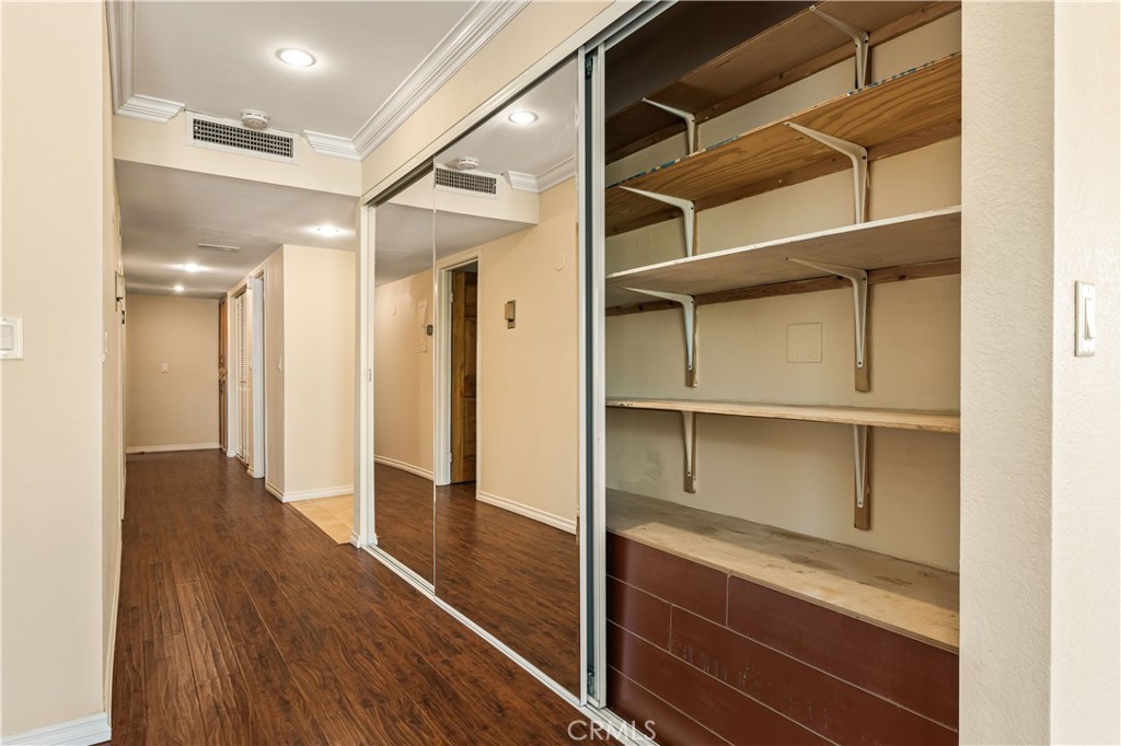 12300 Montecito Road, Unit 42 Seal Beach, CA 90740 - Photo 15 of 44 a view of walk in closet with empty racks