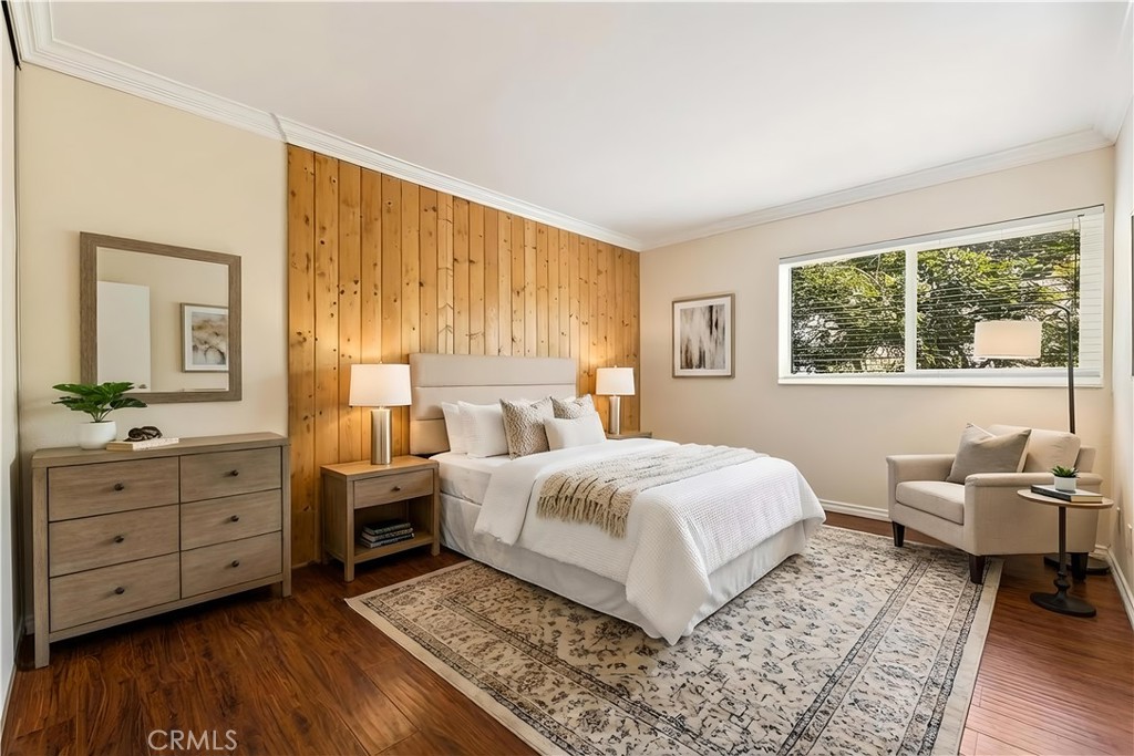 12300 Montecito Road, Unit 42 Seal Beach, CA 90740 - Photo 21 of 44 a bedroom with a large bed and a window