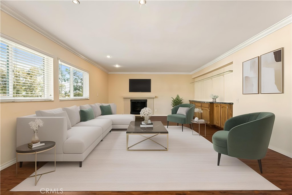 12300 Montecito Road, Unit 42 Seal Beach, CA 90740 - Photo 3 of 44 a living room with furniture white walls and a large window