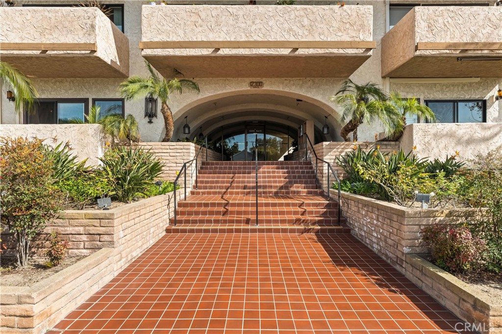 12300 Montecito Road, Unit 42 Seal Beach, CA 90740 - Photo 37 of 44 a front view of a house with a porch
