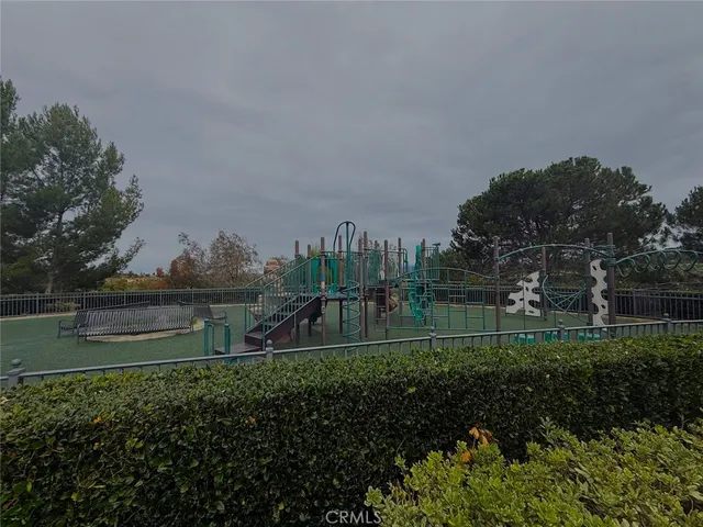 a view of a golf course with a lake