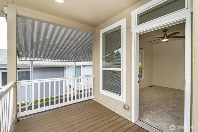 a view of a wooden house with a porch
