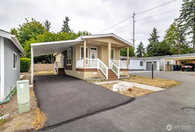 a front view of a house with a porch