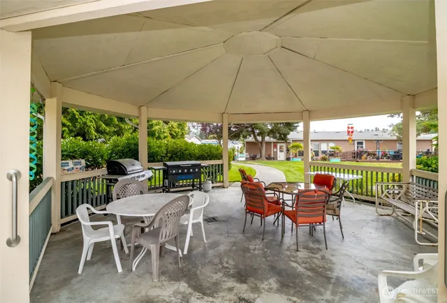 a outdoor space with lots of furniture and garden view