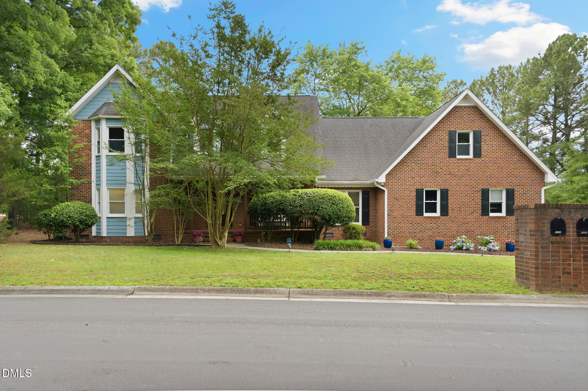 3735 Stoneybrook Drive Durham, NC 27705 - Photo 2 of 44 a view of a yard in front view of a house