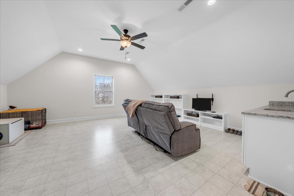 3512 Ashland City Road Clarksville, TN 37043 - Photo 40 of 58 a living room with furniture and a flat screen tv