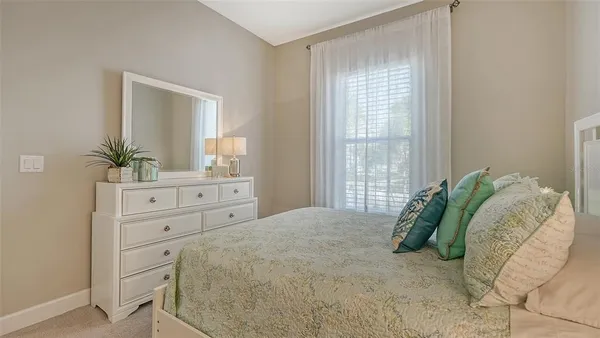 a view of a house with a garden