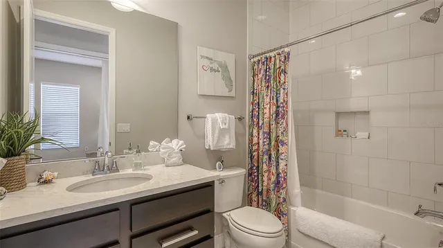 a swimming pool with outdoor seating and yard