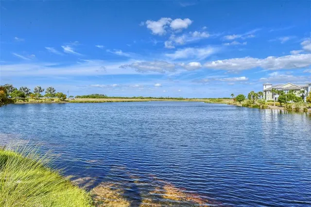 a group of people sitting outside of a building