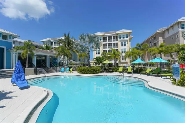 a view of a park with palm trees