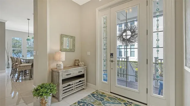 a kitchen with stainless steel appliances granite countertop a sink a stove and cabinets