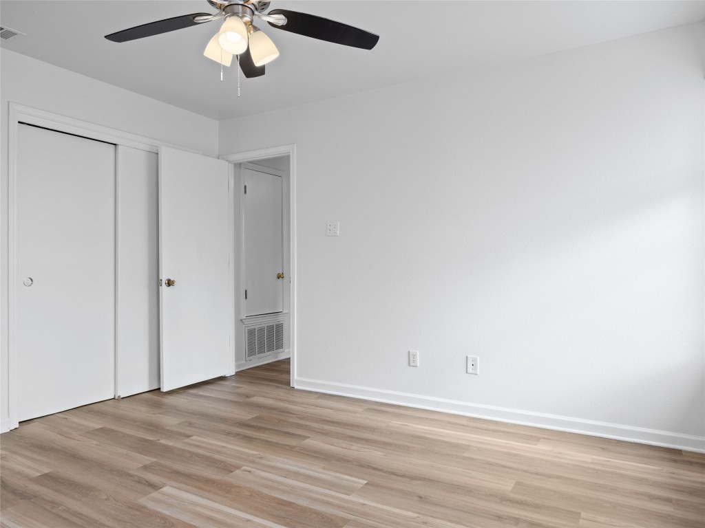 2908 Whisper Oaks Lane Georgetown, TX 78628 - Photo 16 of 32 a view of a livingroom with a chandelier fan