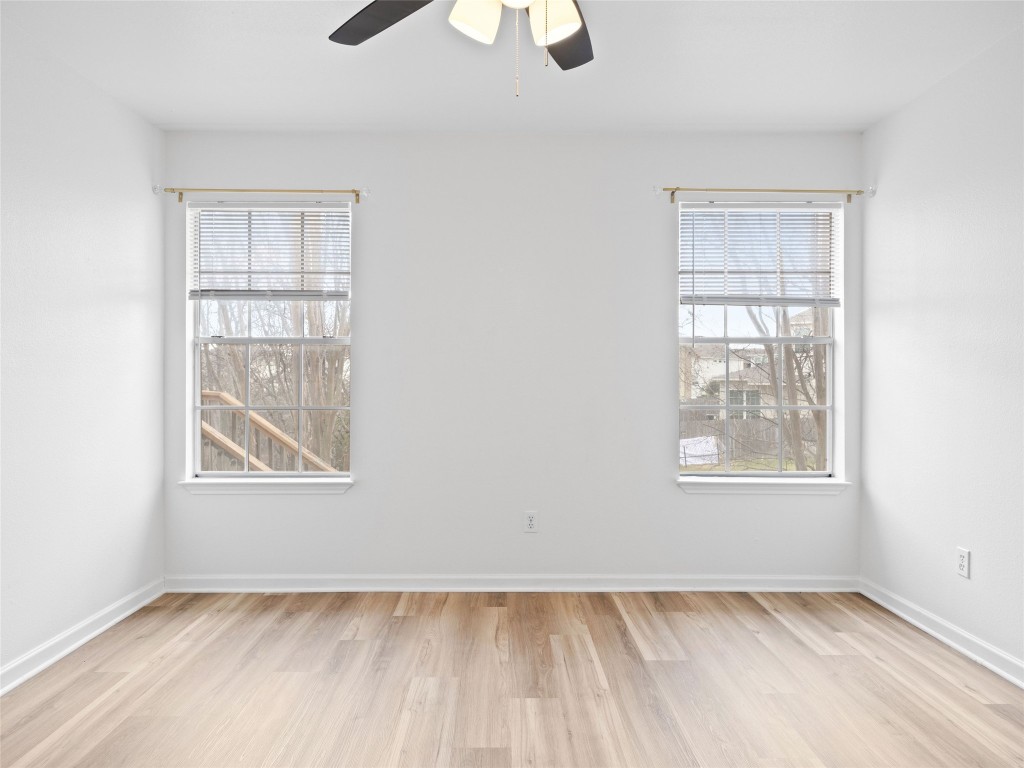 2908 Whisper Oaks Lane Georgetown, TX 78628 - Photo 19 of 32 an empty room with windows