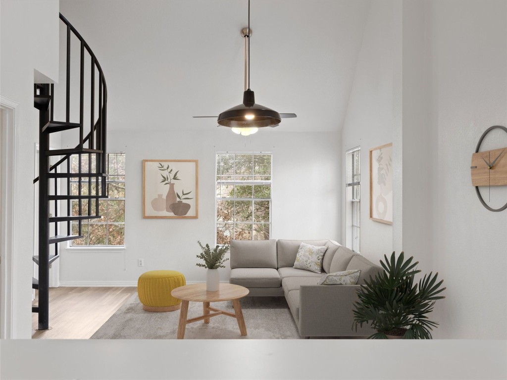 2908 Whisper Oaks Lane Georgetown, TX 78628 - Photo 4 of 32 a living room with furniture a window and a chandelier
