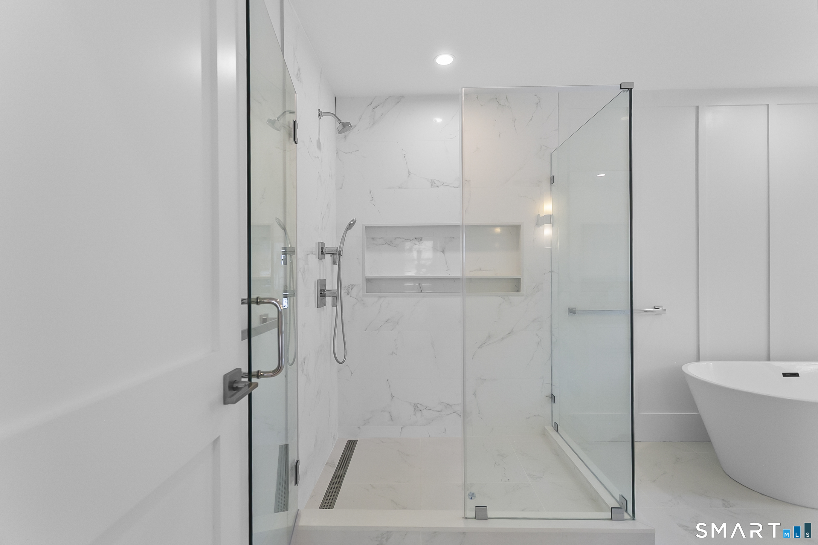 80 Oronoque Hills Road Stratford, CT 06614 - Photo 23 of 31 a bathroom with a bathtub and a shower