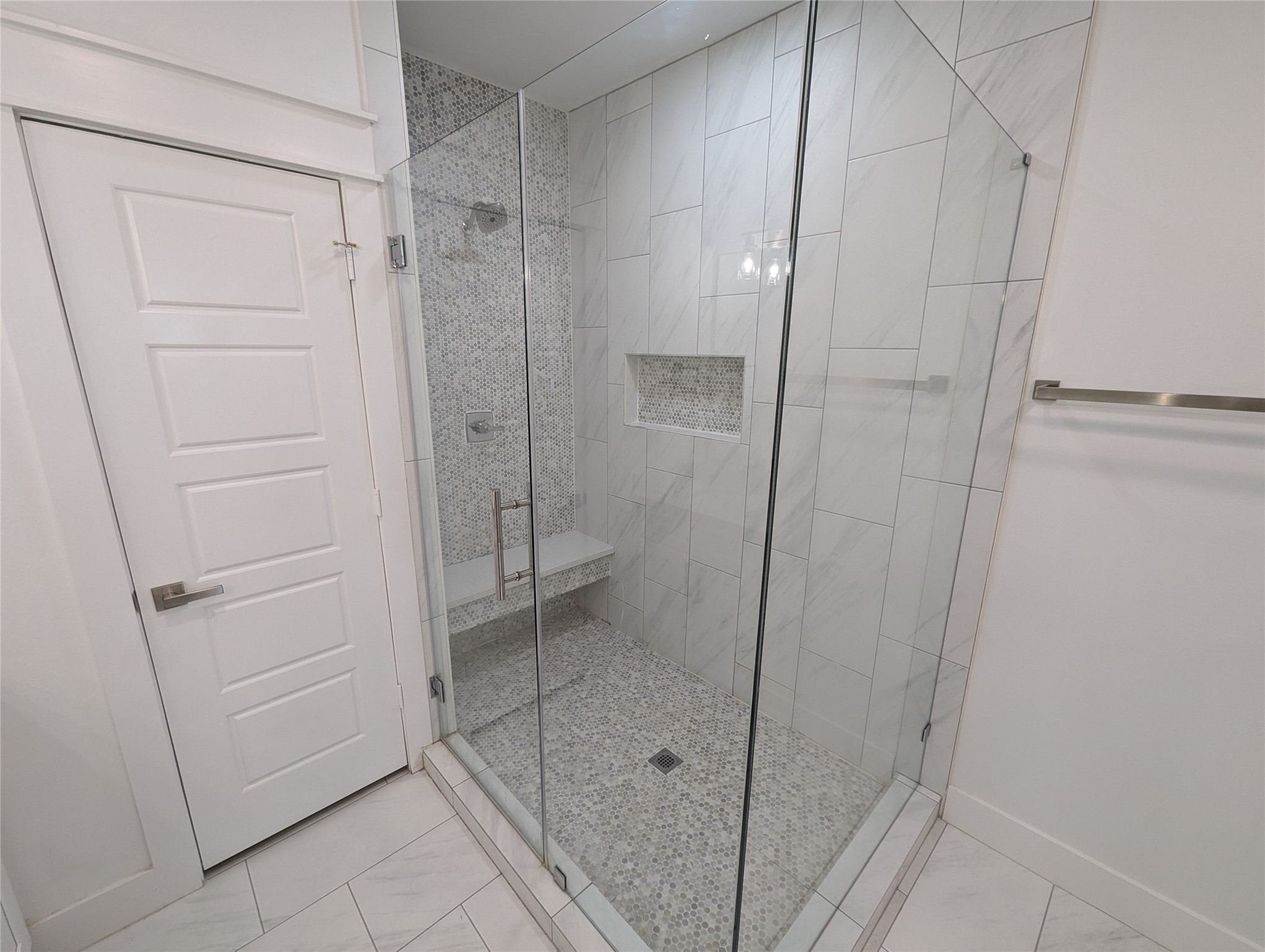 4913 Fisk Street Houston, TX 77009 - Photo 27 of 27 a bathroom with a shower and a glass door