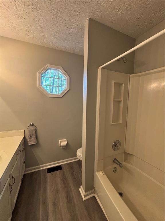 4949 Penscot Way Stone Mountain, GA 30088 - Photo 23 of 40 a bathroom with a bathtub and shower
