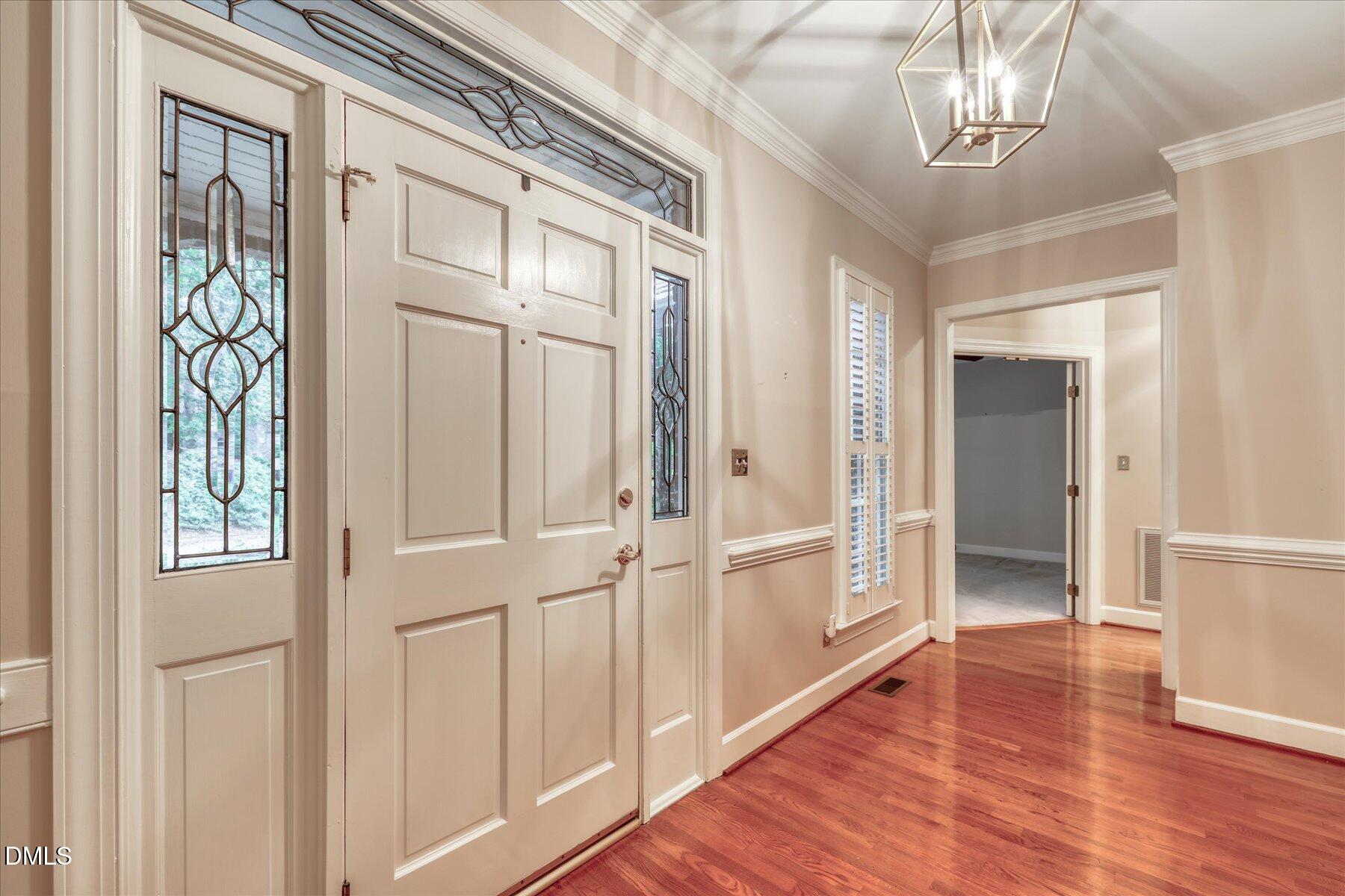 1904 Merion Place Raleigh, NC 27615 - Photo 4 of 43 Bright foyer with beautiful floors