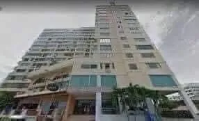 a view of parking garage with cars parked