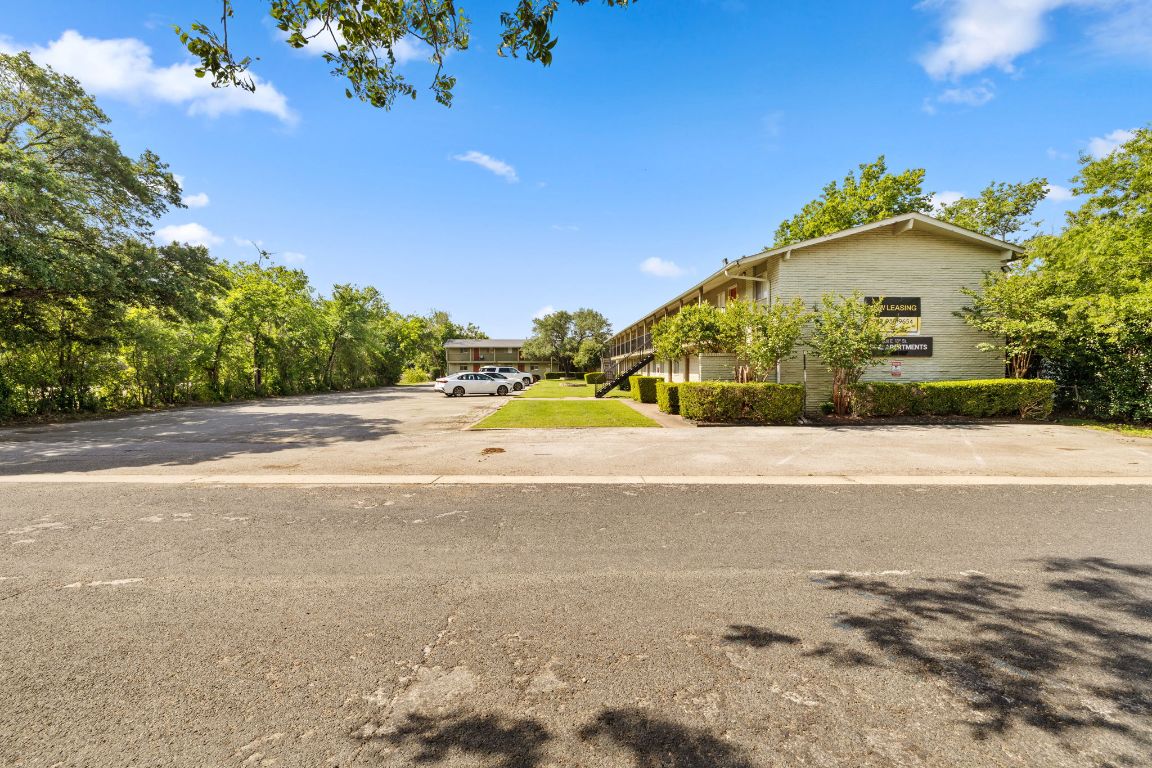 806 East 13th Street, Unit 105 Georgetown, TX 78626 - Photo 2 of 25 a view of a garden