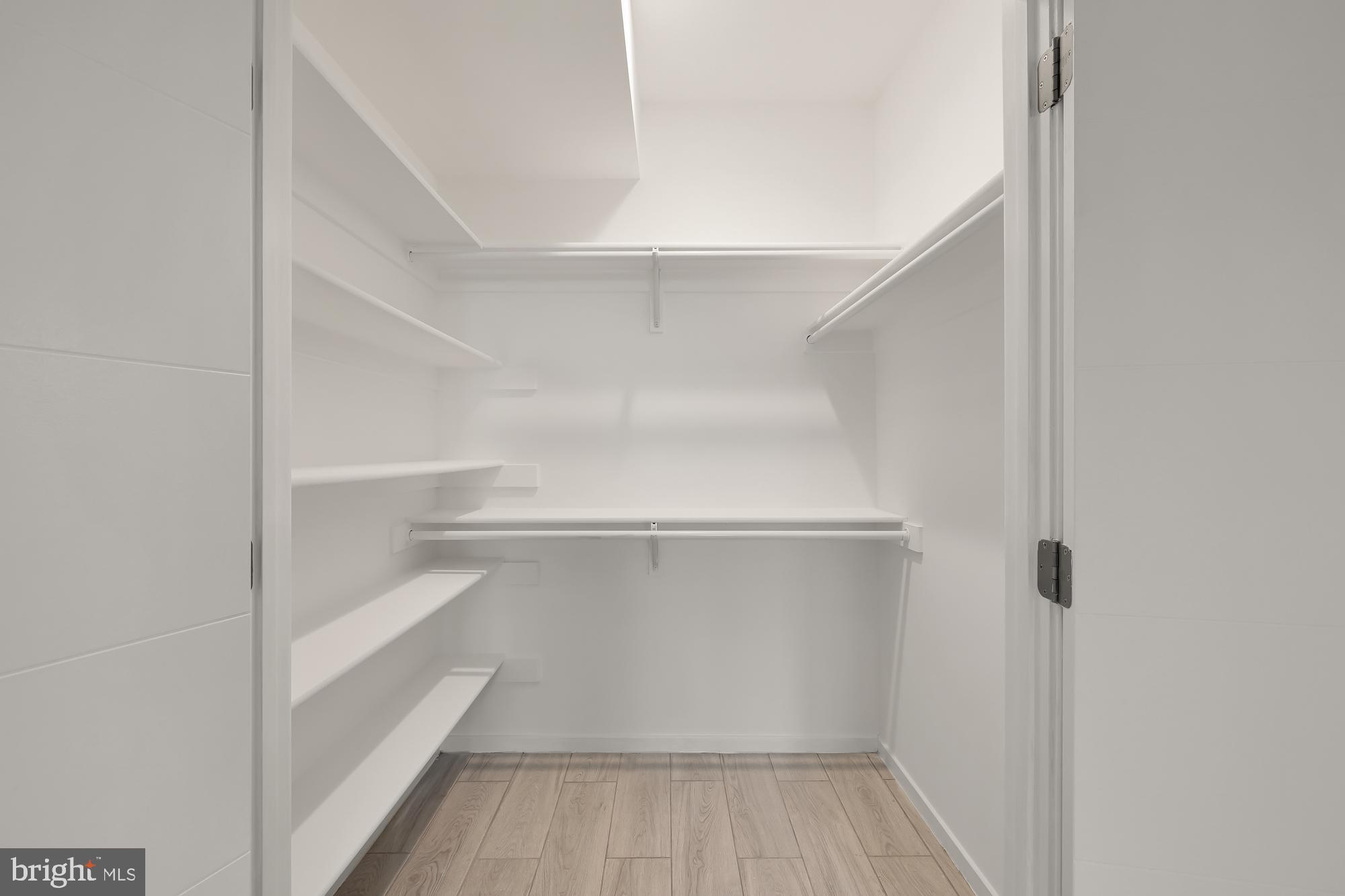 756 Park Road Northwest, Unit 1 Washington, DC 20010 - Photo 15 of 25 a view of walk in closet with empty racks